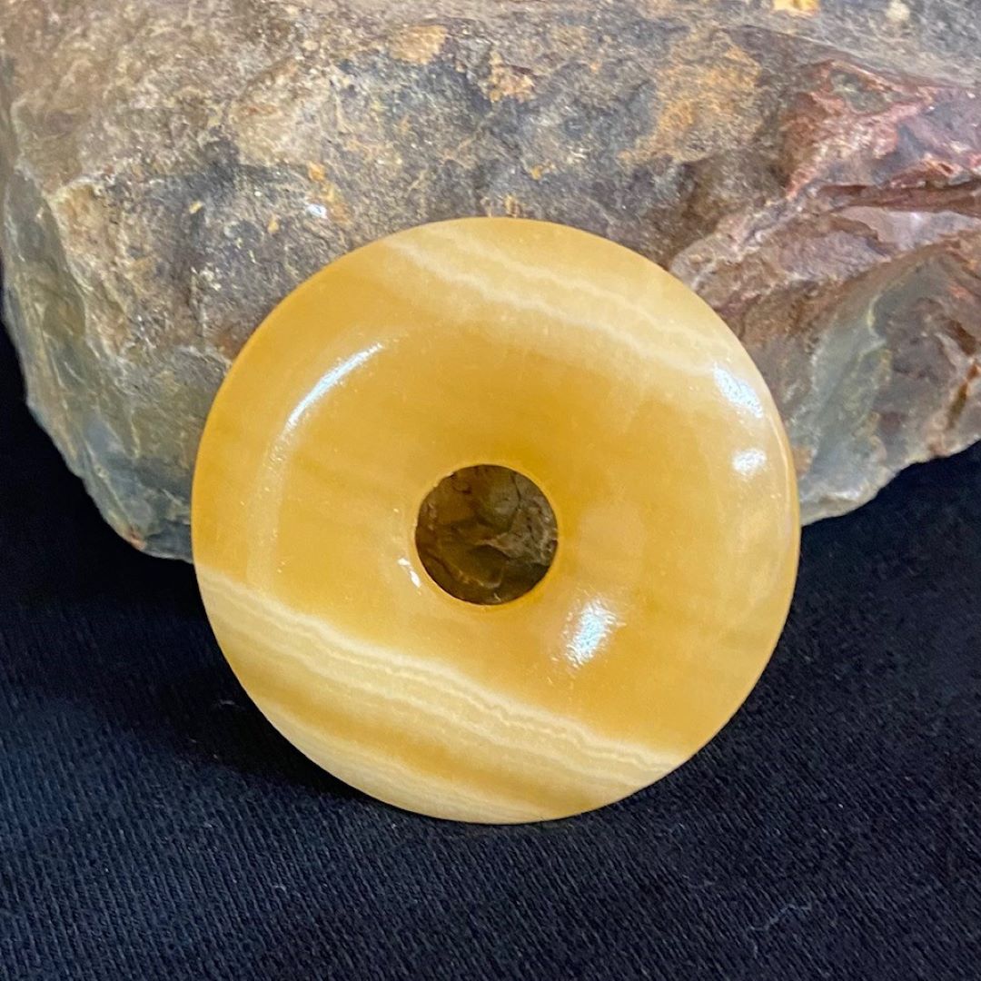 calcit-donut-anhaenger-4cm-3 Calcit Donut Anhänger 4cm