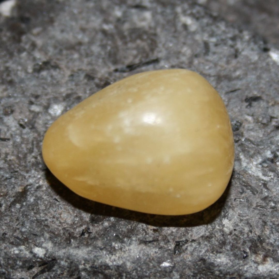 calcit-trommelstein Calcit Trommelstein (Orangencalcit)